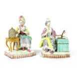 A pair of Meissen figures,