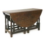 An oak gateleg table,