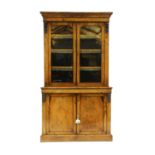 A Victorian rosewood and inlaid bookcase,