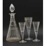 A suite of Stuart drinking glasses and a decanter,
