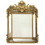 A gilt and gesso Italianate wall mirror,