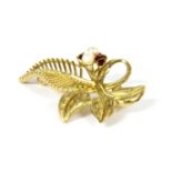 A 9ct gold cultured pearl and garnet leaf brooch