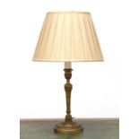 A brass candlestick table lamp,