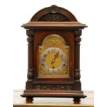 An Edwardian walnut mantel clock,