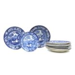 Fourteen blue and white pottery tea plates,