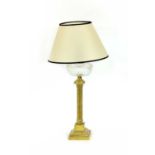 A brass reeded column oil lamp,