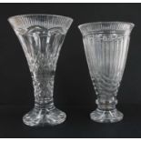 A pair of tall modern clear glass vases,