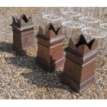 Three glazed stoneware chimney pots,