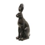 A large bronze model of a seated hare