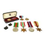 A collection of WWI and WWII medals,