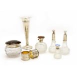 A quantity of silver items including five scent bottles and jars,