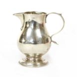 A George III silver sparrow beak jug,