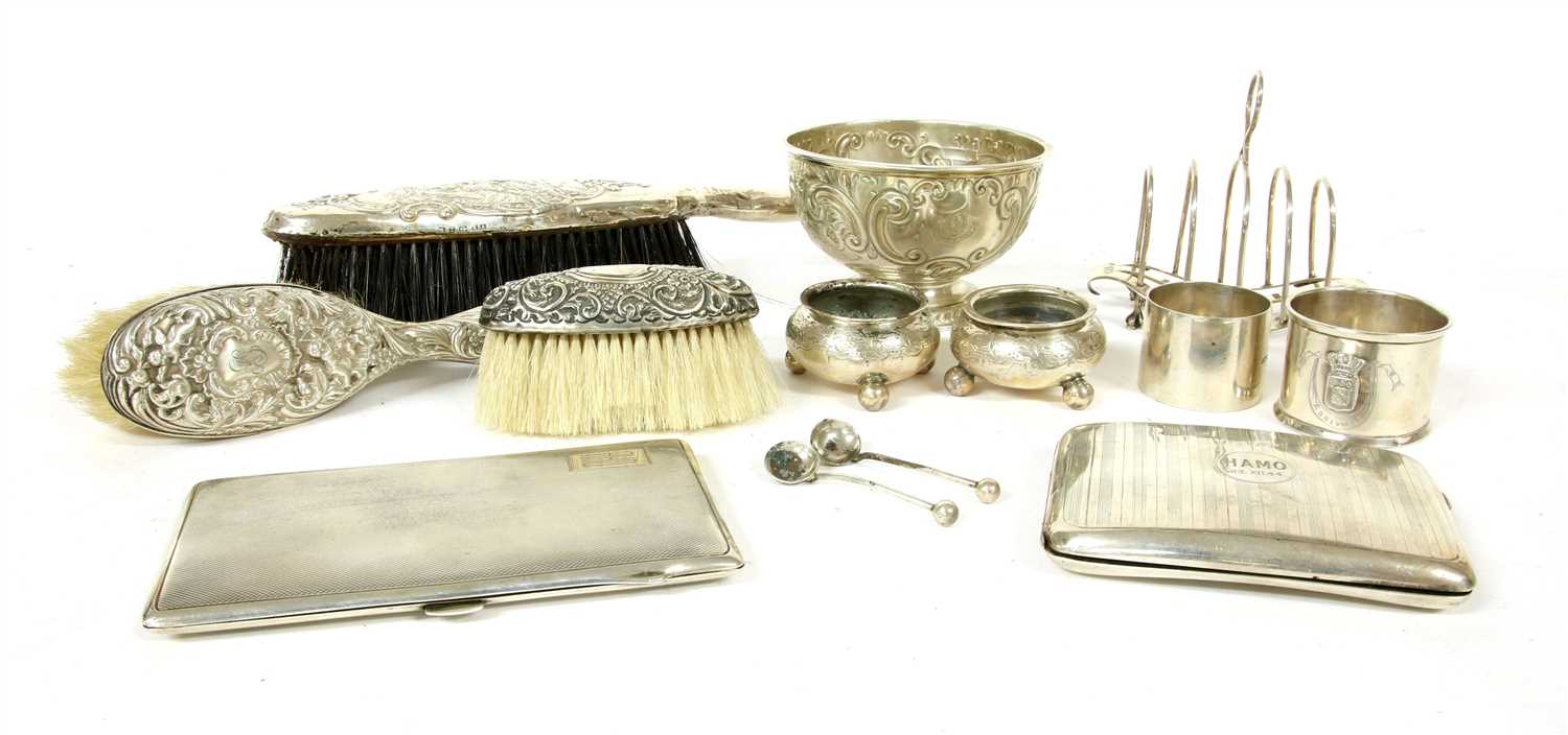 A collection of silver items to include a pair of silver salts by Levesley Brothers,