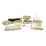 A collection of silver items to include a pair of silver salts by Levesley Brothers,