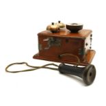 A Peel-Conner wooden wall telephone,