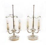 A pair of silver plated bouillotte table lamps,