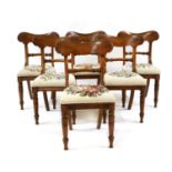 A set of six William IV oak dining chairs