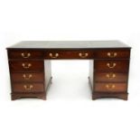 A reproduction mahogany twin pedestal desk,