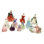 A collection of six Royal Doulton figurines
