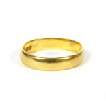 A 22ct gold D section wedding ring,