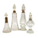 A George V hallmarked silver collared cut glass perfume bottle,