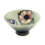 A Moorcroft bowl, having anemones to the interior,