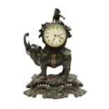A late 19th century French bronze mantel clock,