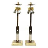 A pair of brass and chrome Italian table lamps,