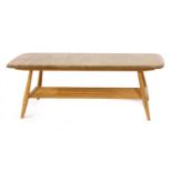 An Ercol elm low table,