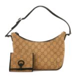 A Gucci tan monogram canvas shoulder bag