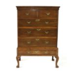 A George III oak chest on stand,