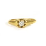 A gold single stone diamond ring,