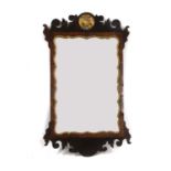 A George II style walnut and mahogany pier mirror,