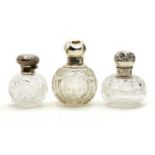 A Victorian hallmarked silver collared cut glass perfume bottle,