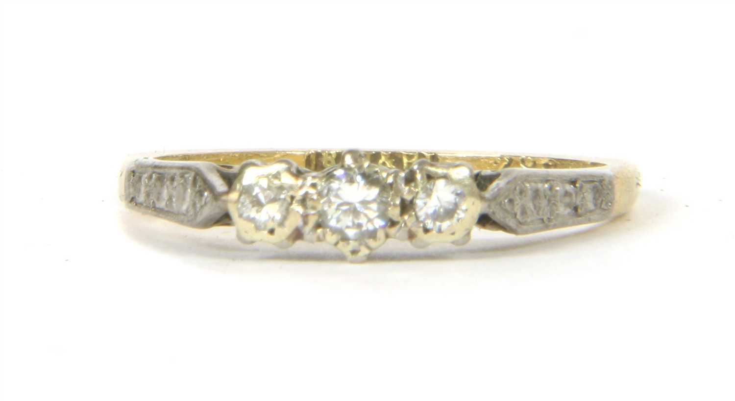 A three stone diamond ring