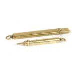 A 9ct gold pencil holder,