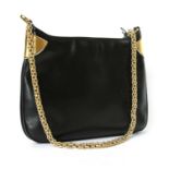 A vintage Gucci black leather shoulder bag