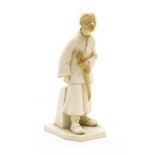 A Royal Worcester figure of a Chinese man,