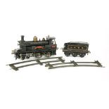 A Bing Gauge Il LNWR live stream 4-4-0 locomotive and tender,