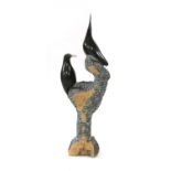 A Zimbabwean carved group of two birds on a rock