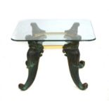 A modern bronze and glass side table,