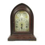 An Edwardian mahogany lancet form bracket clock