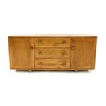 An Ercol elm sideboard,