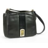 A vintage Gucci black leather and suede shoulder bag