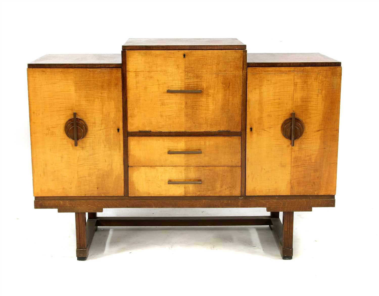 An Art Deco oak and maple cocktail cabinet,
