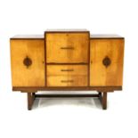 An Art Deco oak and maple cocktail cabinet,