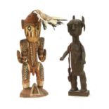 Two large carved and painted West African figures,