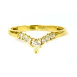 An 18ct gold diamond wishbone ring,