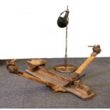 A Stendel early 20th century wooden and cast iron rowing machine,