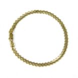 An Italian gold curb chain bracelet,